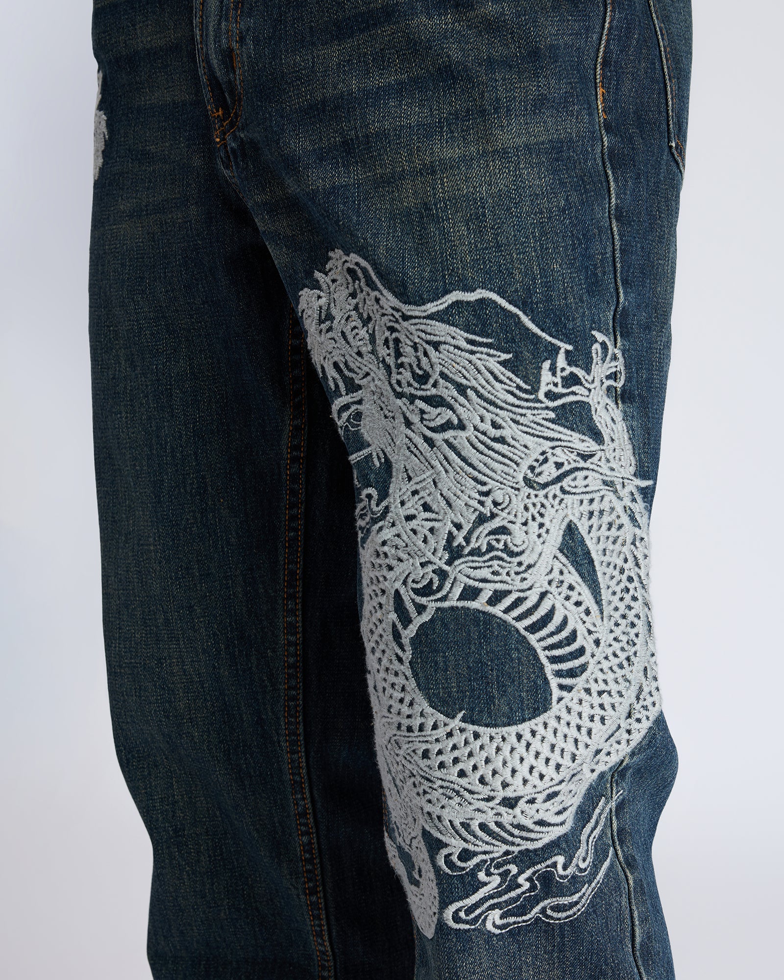 STRAIGHT-LEG JEANS WITH DRAGON EMBROIDERY