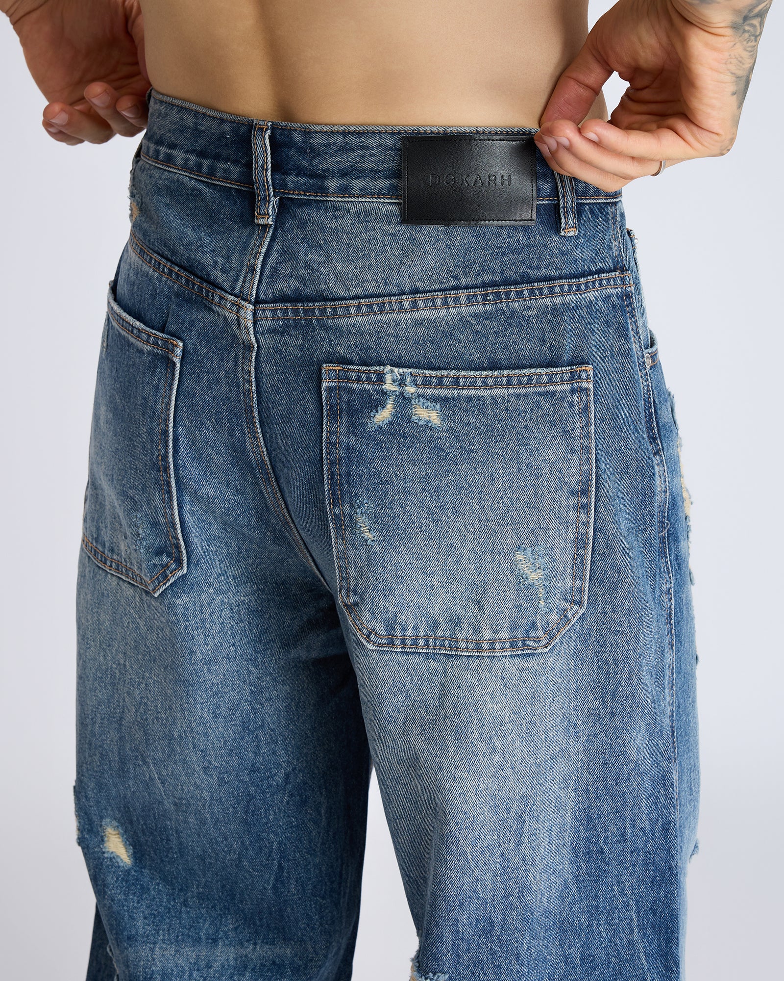 RIPPED STRAIGHT-LEG DENIM JEANS