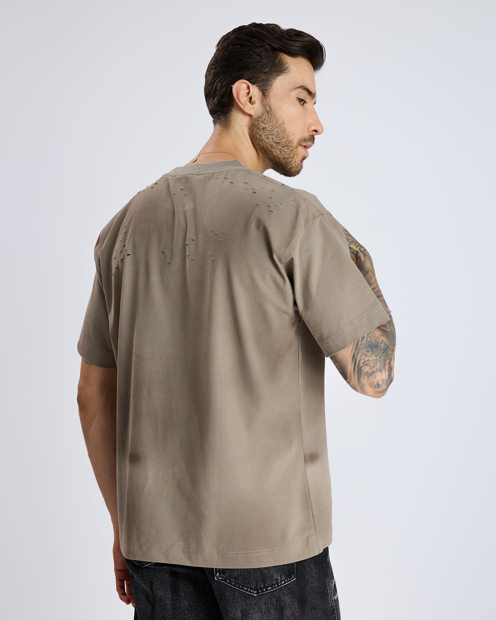 RIPPED T-SHIRT WITH METAL DETAIL