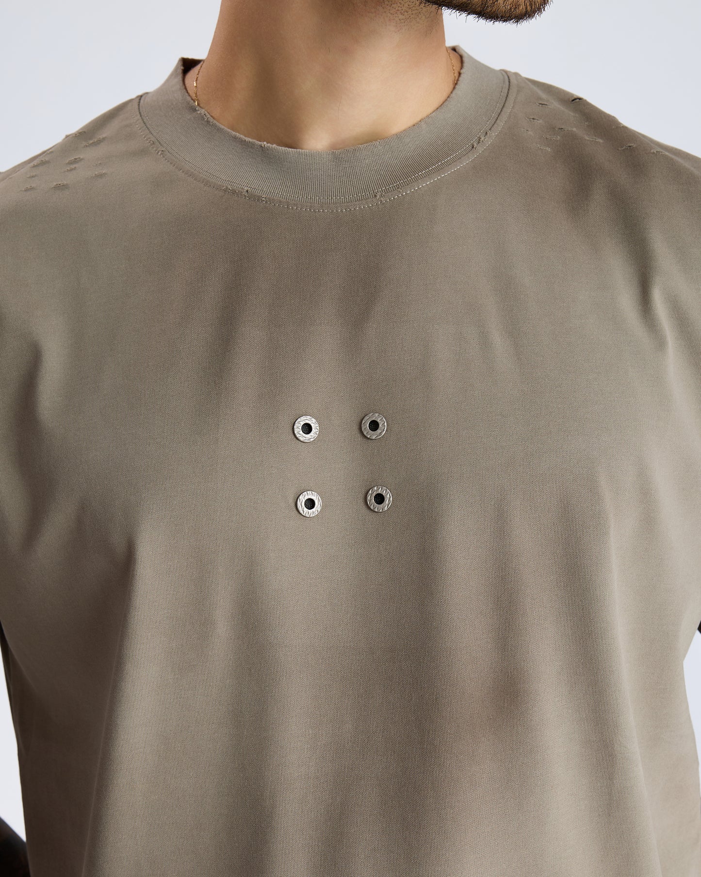RIPPED T-SHIRT WITH METAL DETAIL