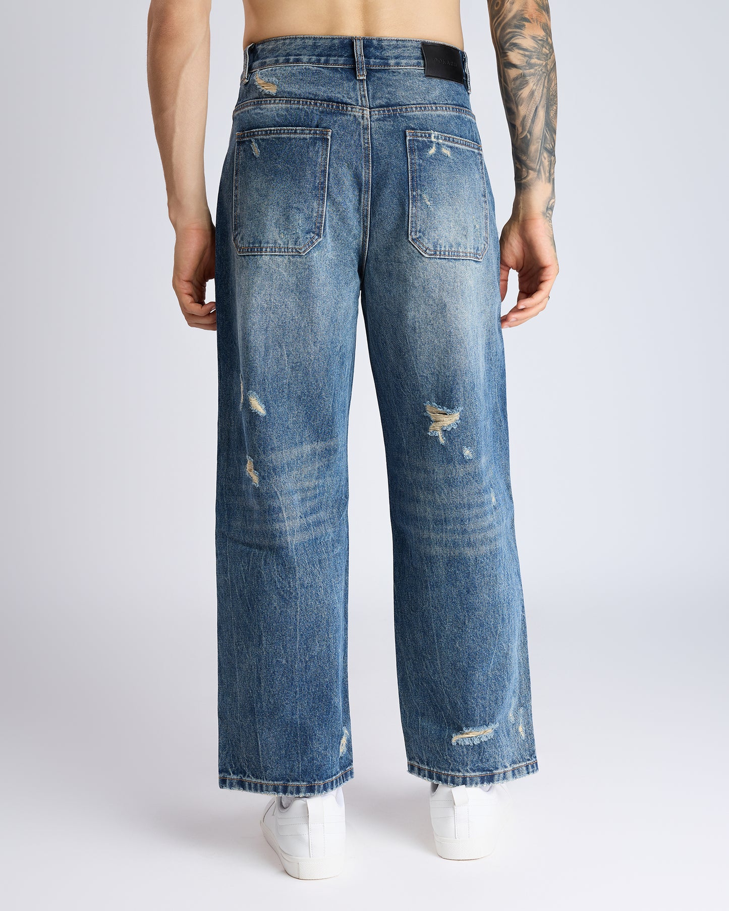 RIPPED STRAIGHT-LEG DENIM JEANS